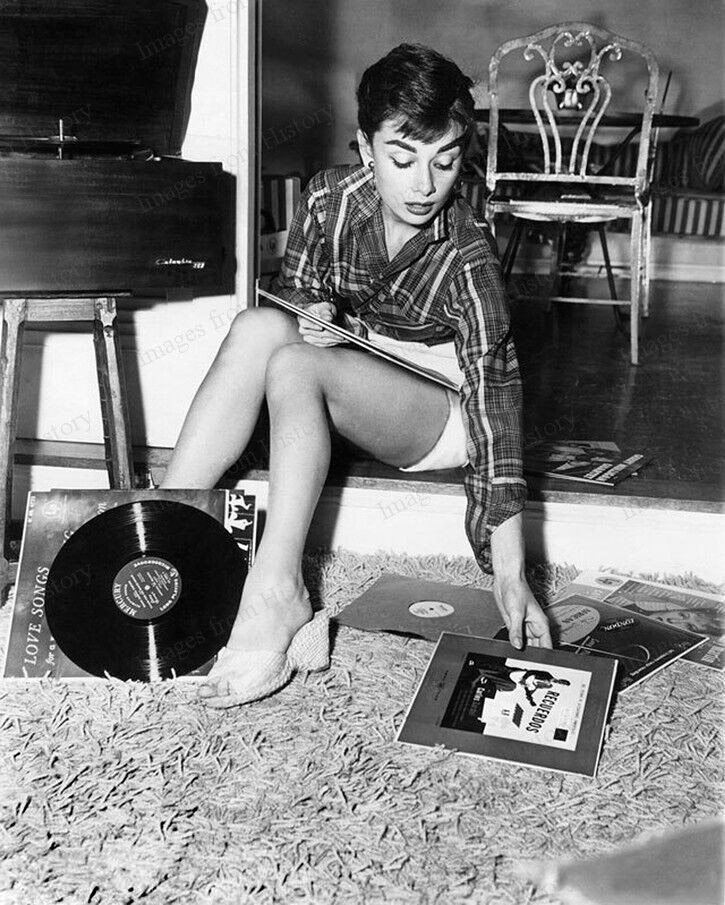 Audrey Hepburn playing records