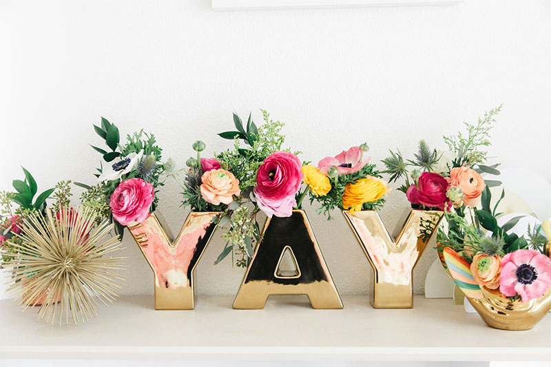 Colorful Decor: Oh Joy! designs Kelly's Golightly's cute kid's room with YAY word vases. #ohjoy #targetstyle #villagolightly #interiordesign #ohjoyfurniture