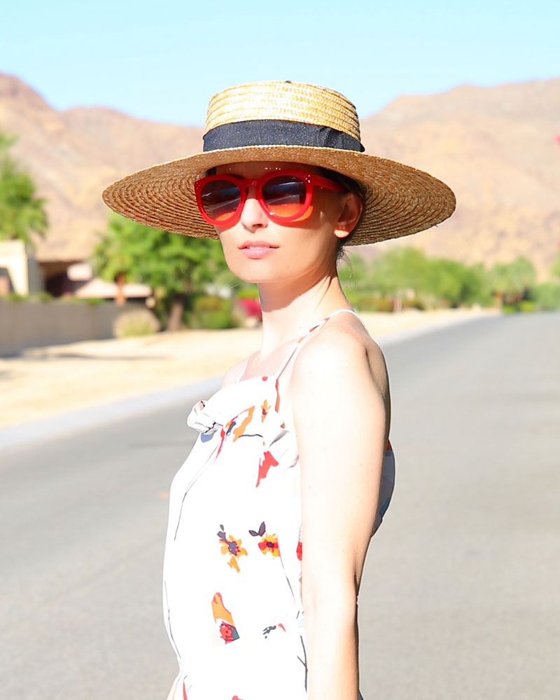 Love these red sunglasses and boater hat for summer! #kellygolightly #jumpsuits #papercrown