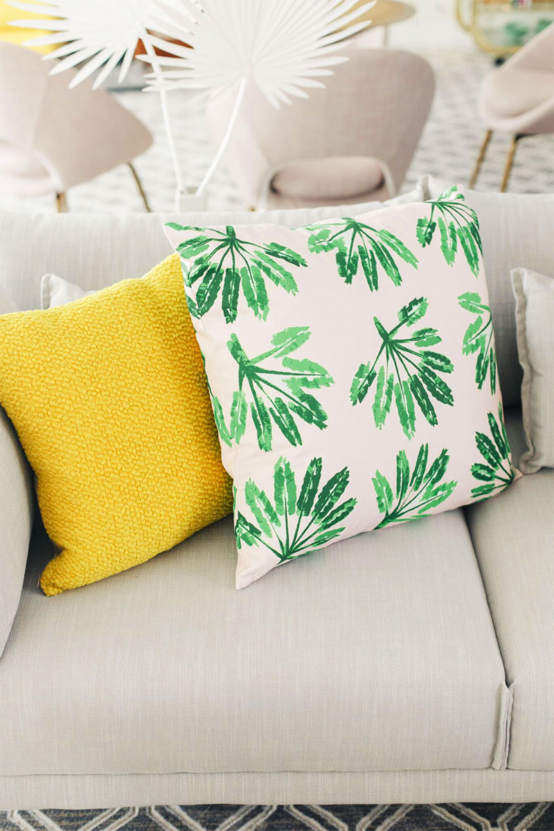 Kelly Golightly's Family Room: See the Before & After #palmspringsstyle #palmprintpillow 