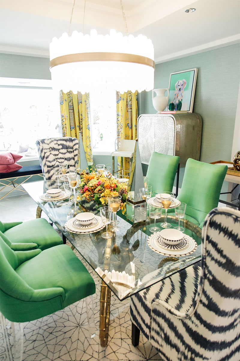 See Kelly Golightly's Colorful Palm Springs Dining Room featuring an iconic ram's head table, designed by Christopher Kennedy for ideas. #palmspringsstyle #palmsprings #traditionalhome #interiorinspo #sodomino #mydomaine #diningroom