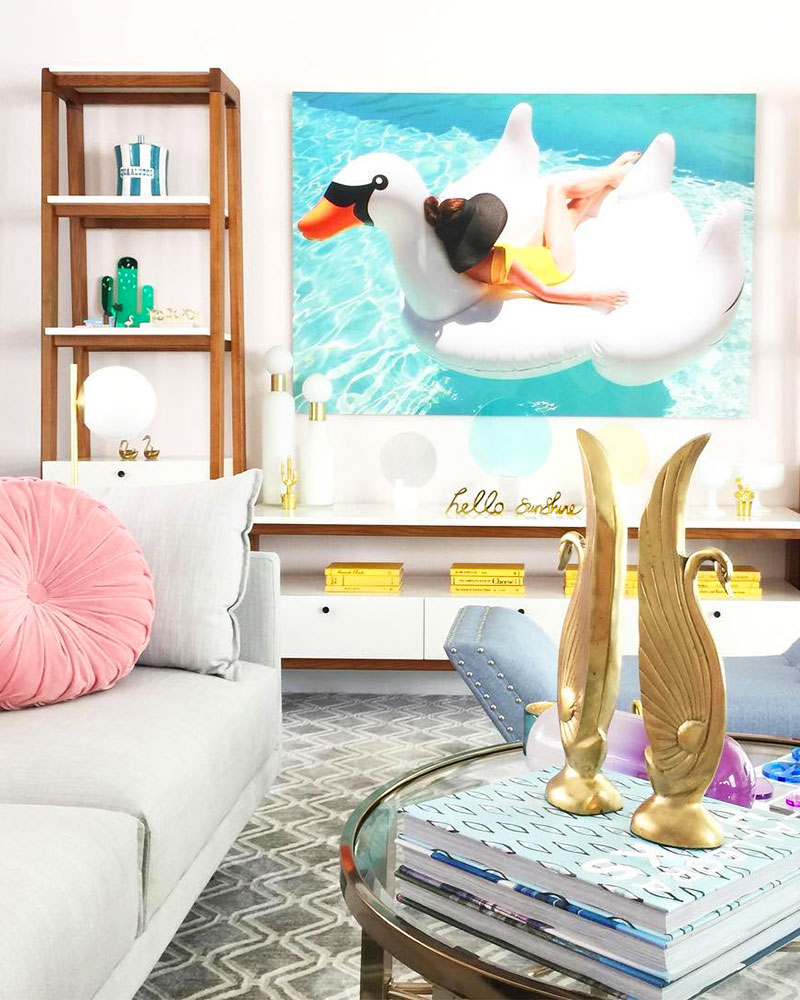 Love this Swanning art in Kelly Golightly's living room! #kellygolightly #giantswan #sunnylife #funboy #mywestelm #westelm #jonathanadler