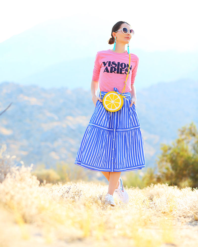 Cool Astrology Tshirts: Vision Aries paired with blue-and-white striped skirt + lemon bag. #kellygolightly