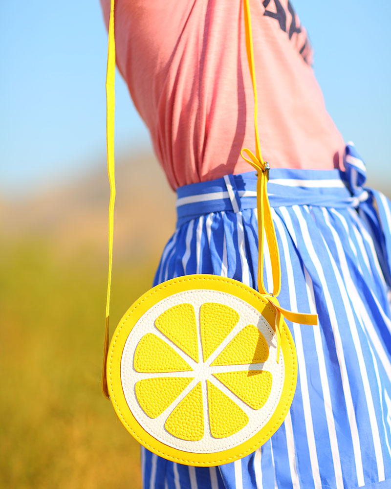 What to Buy at the J.Crew 30% off sale + the coupon code! || Colorful fashion blogger Kelly Golightly wearing cute Feiyue sneakers + pink shirt paired with blue-and-white striped skirt + lemon bag. #kellygolightly #jcrew #feiyue #stripes