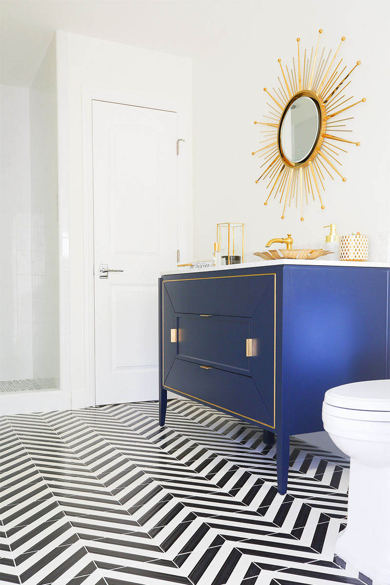 A balloon-filled shower? Yes please! See more of lifestyle blogger Kelly Golightly'd Palm Springs pool bath designed by Salvador Camarena. How great is the chevron tile?