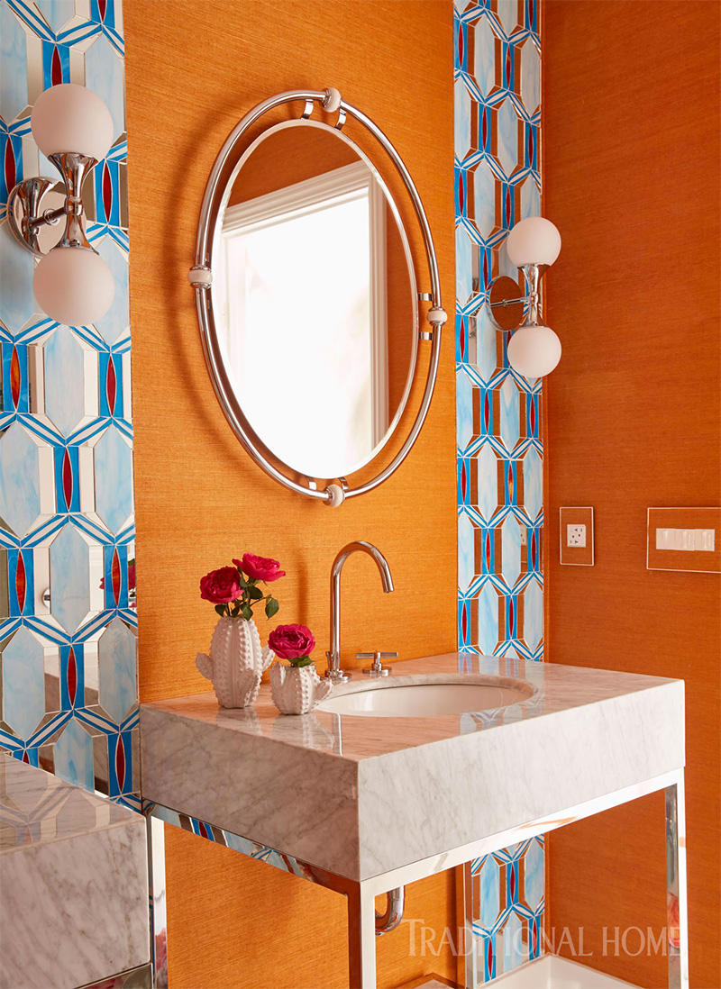 guest room bath with orange walls