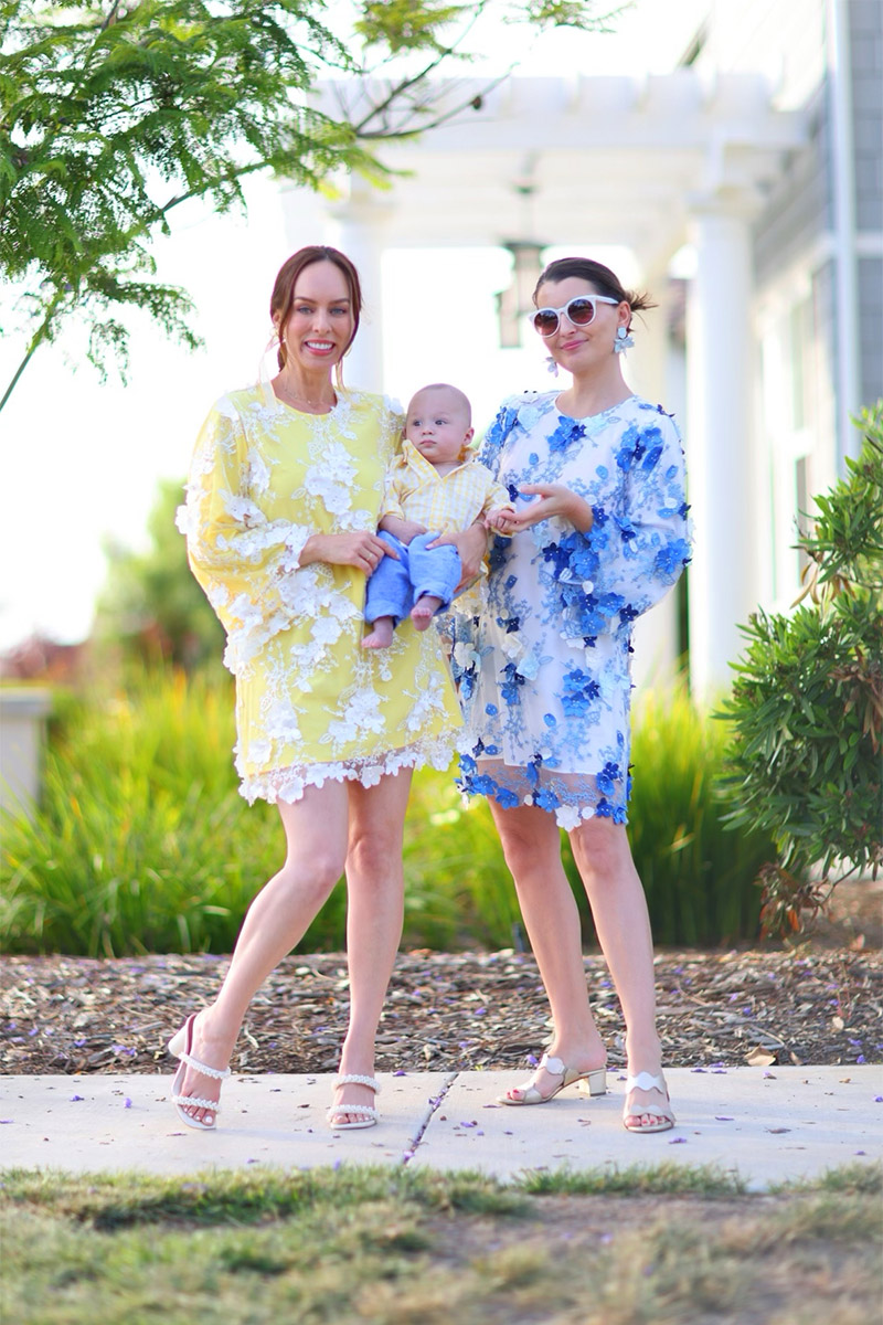 Top LA fashion bloggers Sydne Summer of Sydne Style and Kelly Golightly wear the perfect Wedding Guest Dress, a floral mini caftans in yellow on Sydne and in blue on Kelly, by the brand Mestiza. 