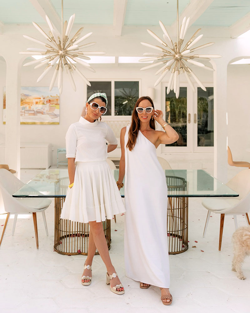 Kelly Golightly and Sydne Summer wears classic pretty white dress by Kelly Golightly x Shop Buru at Villa Golightly in Palm Springs. 